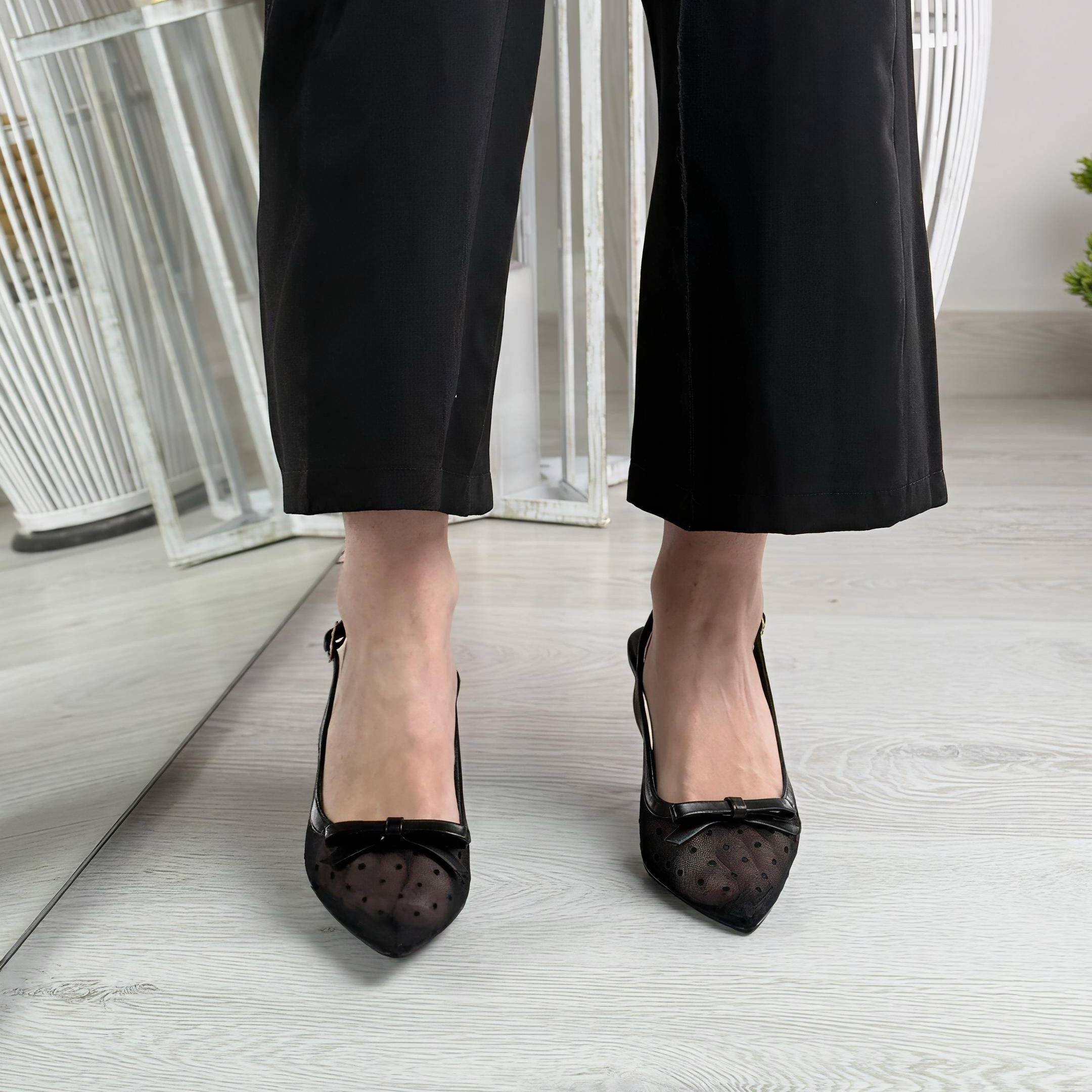 Lilit_Decolletè nero in tulle con fiocco